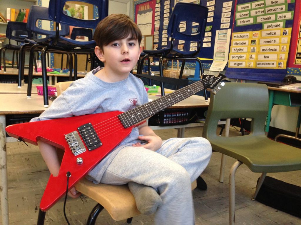guitar lessons for 7 year old: Lucas with Flying V